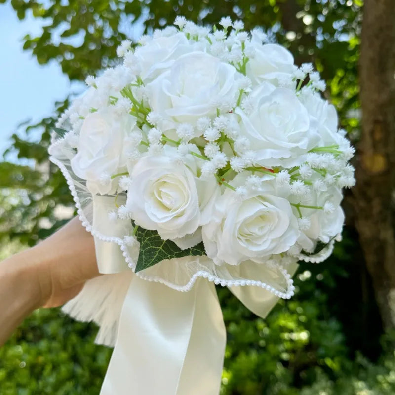 Elegant silk wedding bouquet showcasing baby's breath roses, perfect for a sophisticated wedding ceremony.