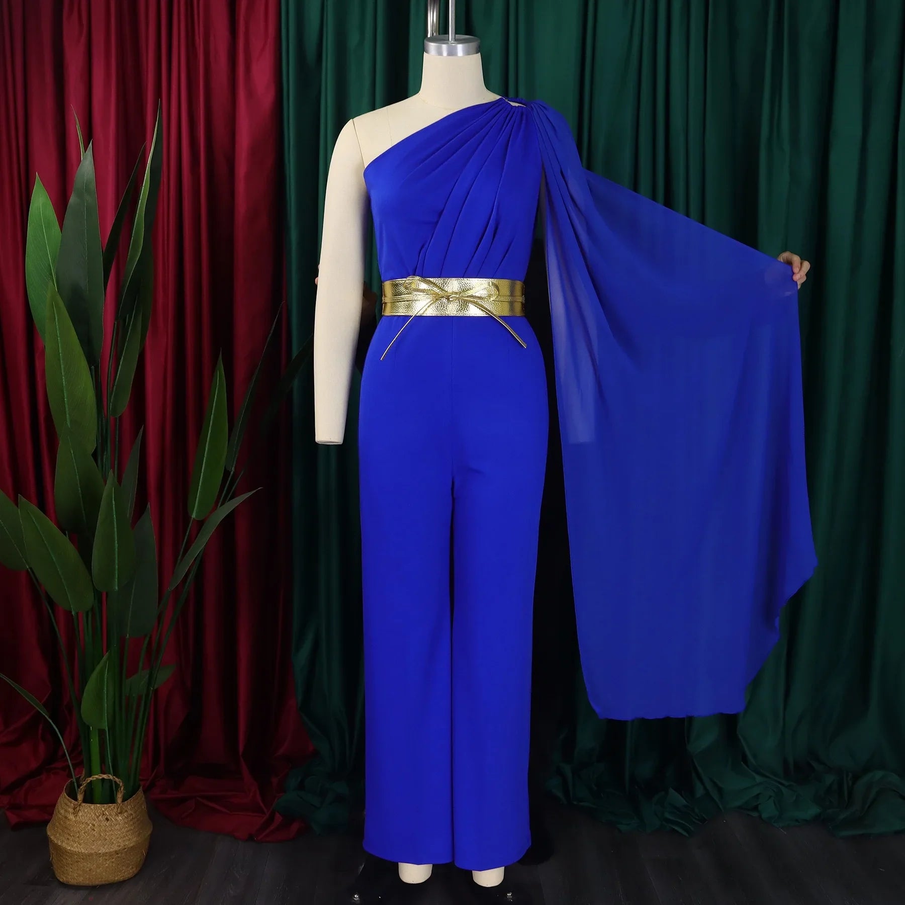 Stylish solid pattern one shoulder jumpsuit for women, showcasing a flattering fit and high waist design, ideal for all season wear.