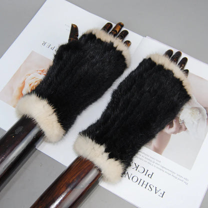 Fashion-forward women's knitted gloves in 100% mink fur, perfect for typing while staying warm and elegant.
