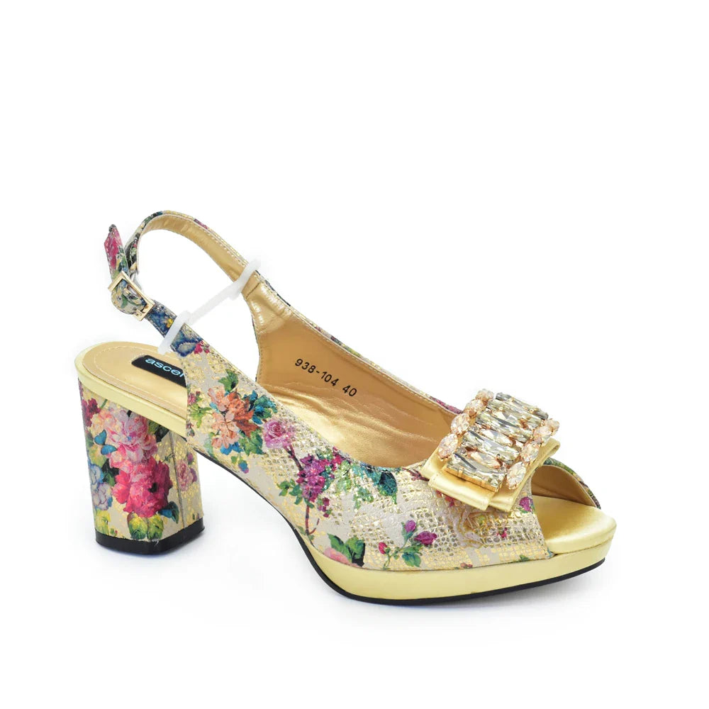 Refined silver peep toe pumps with an exquisite handbag, offering a luxurious look for weddings and elegant gatherings.