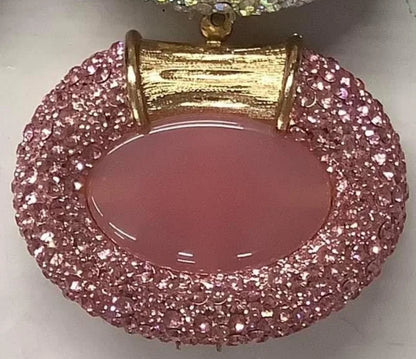 Elegant evening minaudiere clutch bag designed for women, showcasing a stylish metallic finish and sparkling crystals.