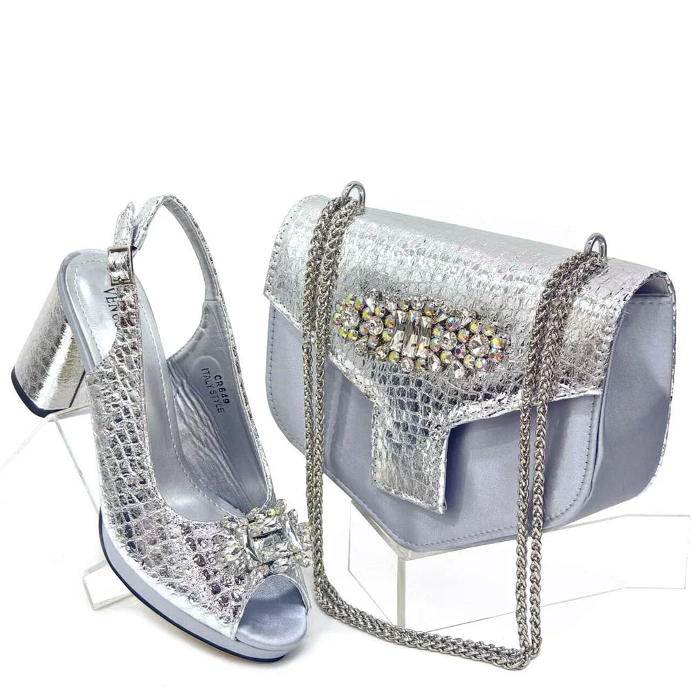 Stylish women's shoe and handbag set in mixed colours featuring high heel and elegant design, ideal for fashion-forward ladies.