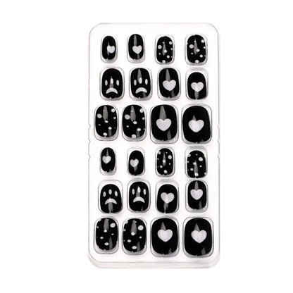 Elegant display of 24 pieces of acrylic press-on false nails for kids, featuring a charming candy flower design, perfect for enhancing youthful nail decoration.