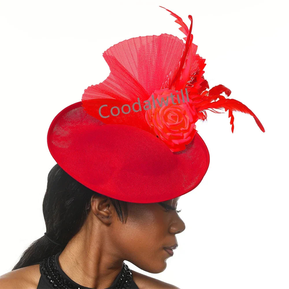 Stylish pillbox cap adorned with floral accents and feathers, ideal accessory for sophisticated women's attire for special occasions.