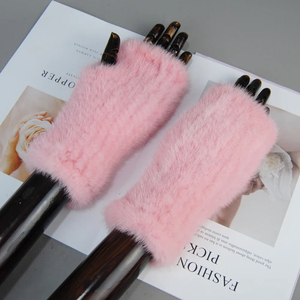 Elegant mink fur gloves for women showcasing a fashionable design, ideal for keeping hands warm.