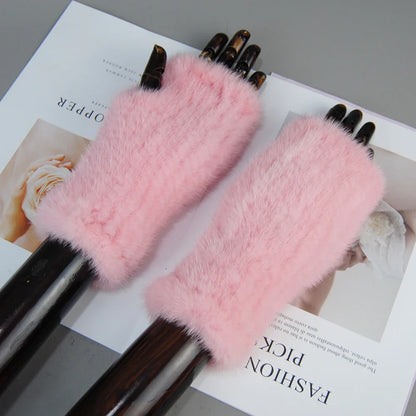 Elegant mink fur gloves for women showcasing a fashionable design, ideal for keeping hands warm.