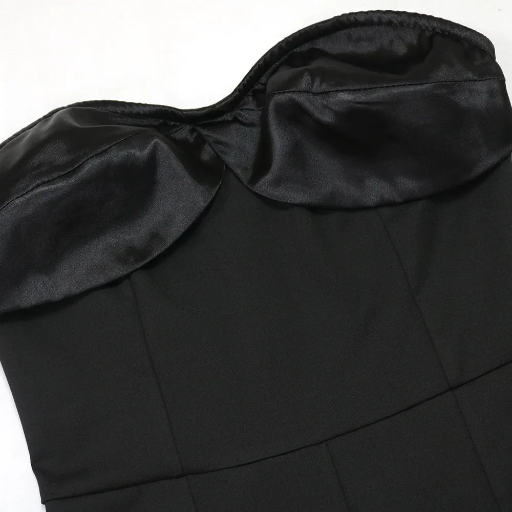 Elegant strapless sleeveless jumpsuit for women, featuring a slim fit, long pant design and exquisite ruffled patchwork detail, ideal for middle-aged fashion-forward individuals.