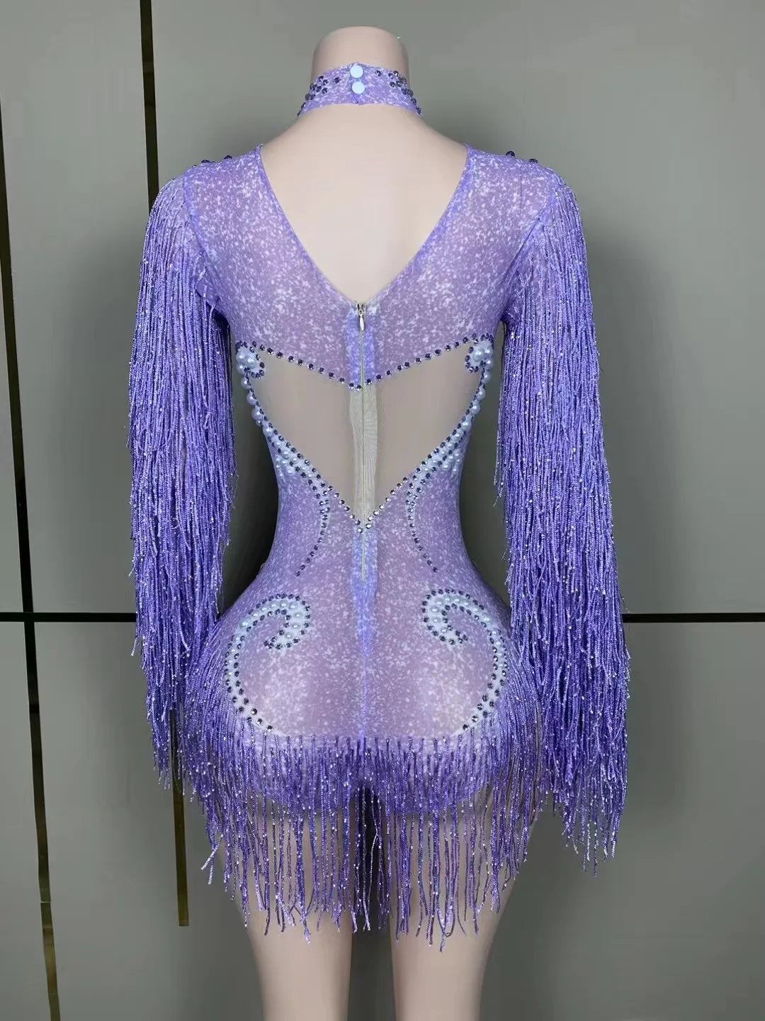 Sophisticated pose of a model in the luxury women's cha-cha dance practice suit, highlighting the elegant design and vibrant movement during practice.