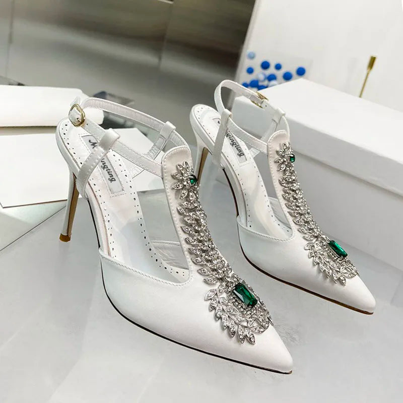 Glamorous pointed toe stiletto heels with exquisite rhinestone detailing, designed for the modern bride.