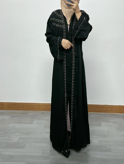 Stylish Moroccan Dubai dress with a flowing skirt, embodying a blend of casual and ethnic elegance for all seasons.