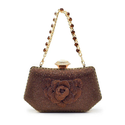 Stylish women's rhinestone shoes in silver with pointed toe, complementing the exquisite matching handbag.