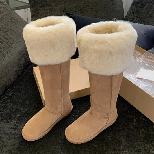 Chic slip-on women's snow boots, showcasing a sophisticated blend of luxurious fur lining and robust EVA insoles, perfect for fashionable cold weather wear.