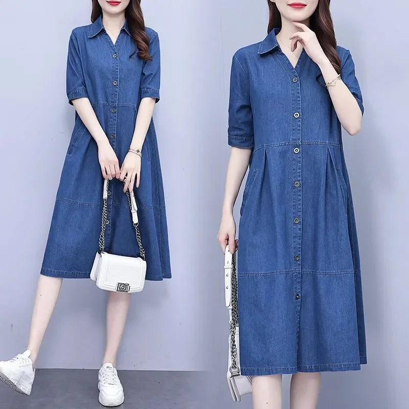 Fashion-forward model wearing the oversized 5XL denim dress with short sleeves, displaying the sophisticated square collar and casual elegance, suitable for upscale summer occasions.