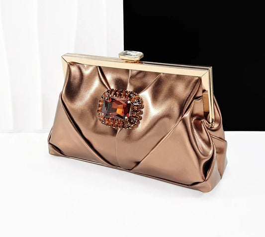 Chic handbag featuring a long chain shoulder strap, complemented by a luxury rhinestone pump set in sophisticated coffee hue, ideal for parties.