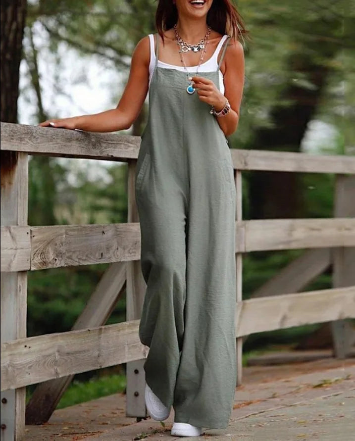 Stunning view of Women's Plus Size Ankle-Length Jumpsuit with pockets, styled for a trendy streetwear look in breathable cotton and linen fabric.
