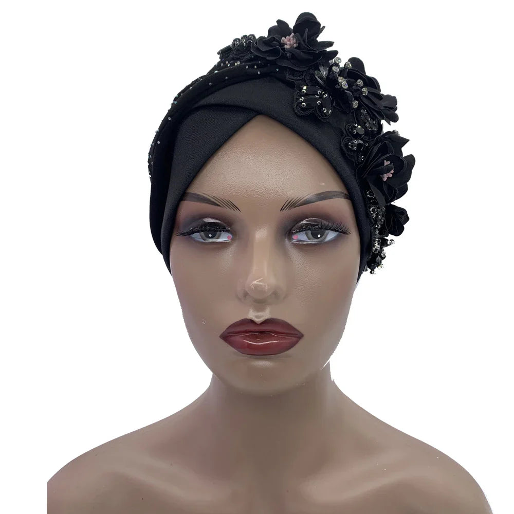 Sophisticated African turban cap with diamond-like embellishments, designed for women who appreciate luxury in their fashion accessories.