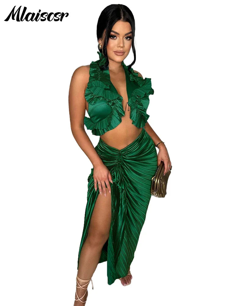 Close-up of Mlaiscsr Elegant Black Dress Set, showcasing the intricate details of the ruched crop top and elegant pleated skirt, designed for a luxurious autumn/winter look.