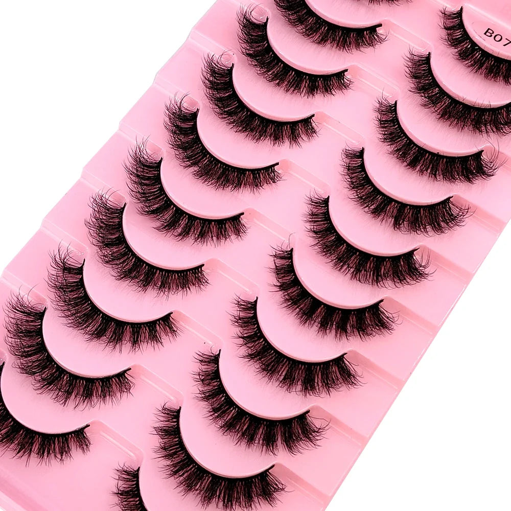 High-quality synthetic hair 3D faux mink lashes arranged in a stylish manner, exemplifying luxury and comfort for bold and glamorous eye makeup.
