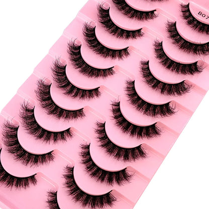 High-quality synthetic hair 3D faux mink lashes arranged in a stylish manner, exemplifying luxury and comfort for bold and glamorous eye makeup.
