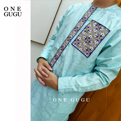 Elegant premium waterproof African men's 2-piece set featuring a blue cotton shirt and pants, perfect for special occasions.