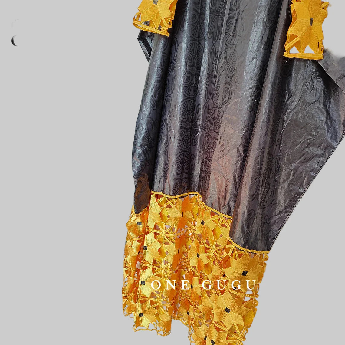 Beautifully crafted peach African style gown with rich gold embroidery, perfect for upscale events and traditional celebrations.