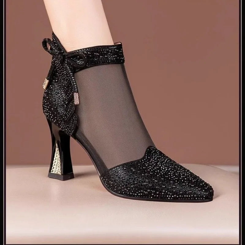 Elegant rhinestone high heel ankle boots with pointed toe design, perfect for women. These breathable dress pumps in size 43 feature a stylish thin heel, suitable for spring and autumn occasions. Crafted from premium PU with a luxurious latex foam insole, these sexy boots add a sophisticated touch to any outfit.