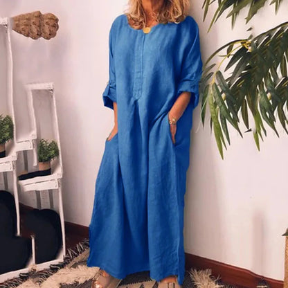 Elegant plus size women's long sleeve O-neck summer maxi dress in solid colour with pockets, featuring a casual A-line silhouette for sophisticated comfort.