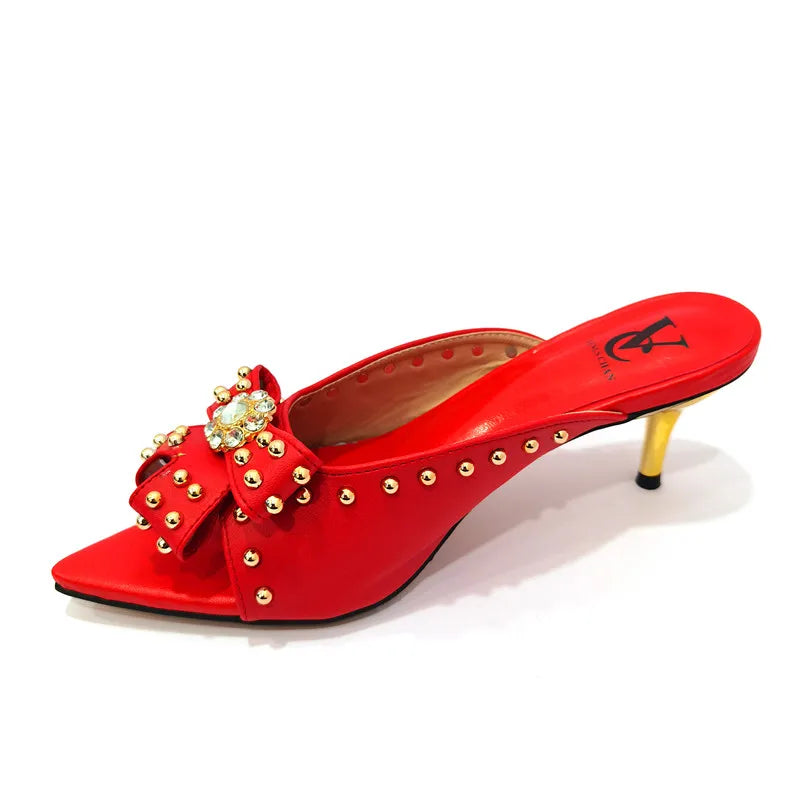 Luxury matching bag set designed to complement stylish women’s high heeled shoes, offering a chic touch in vibrant hues for modern fashion enthusiasts.