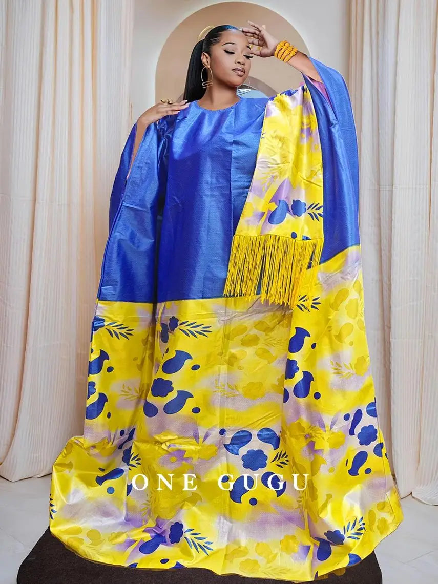 Luxury African Dashiki wedding dress in vibrant blue Bazin Riche fabric, complemented by a stunning tassel shawl for women, perfect for elegant occasions.