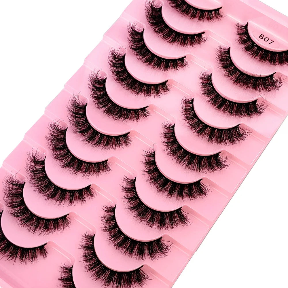 Luxury 3D Faux Mink Lashes in a stylish packaging, showcasing 10 pairs of fluffy, soft, and thick dramatic wispy false eyelashes for exquisite makeup looks.