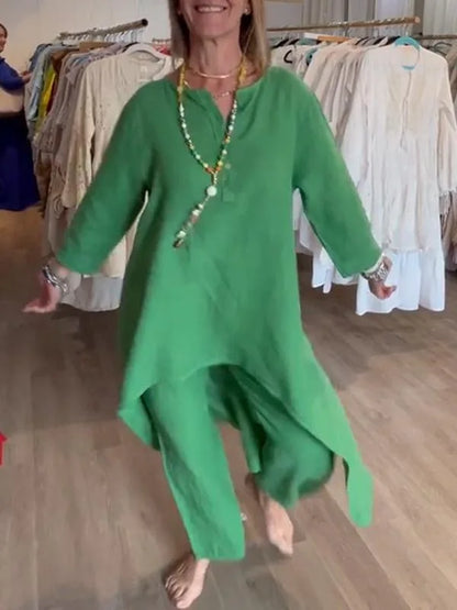 Trendy plus size women's casual linen set in a serene solid colour, featuring a tailored long top and relaxed wide leg slacks for effortless elegance.