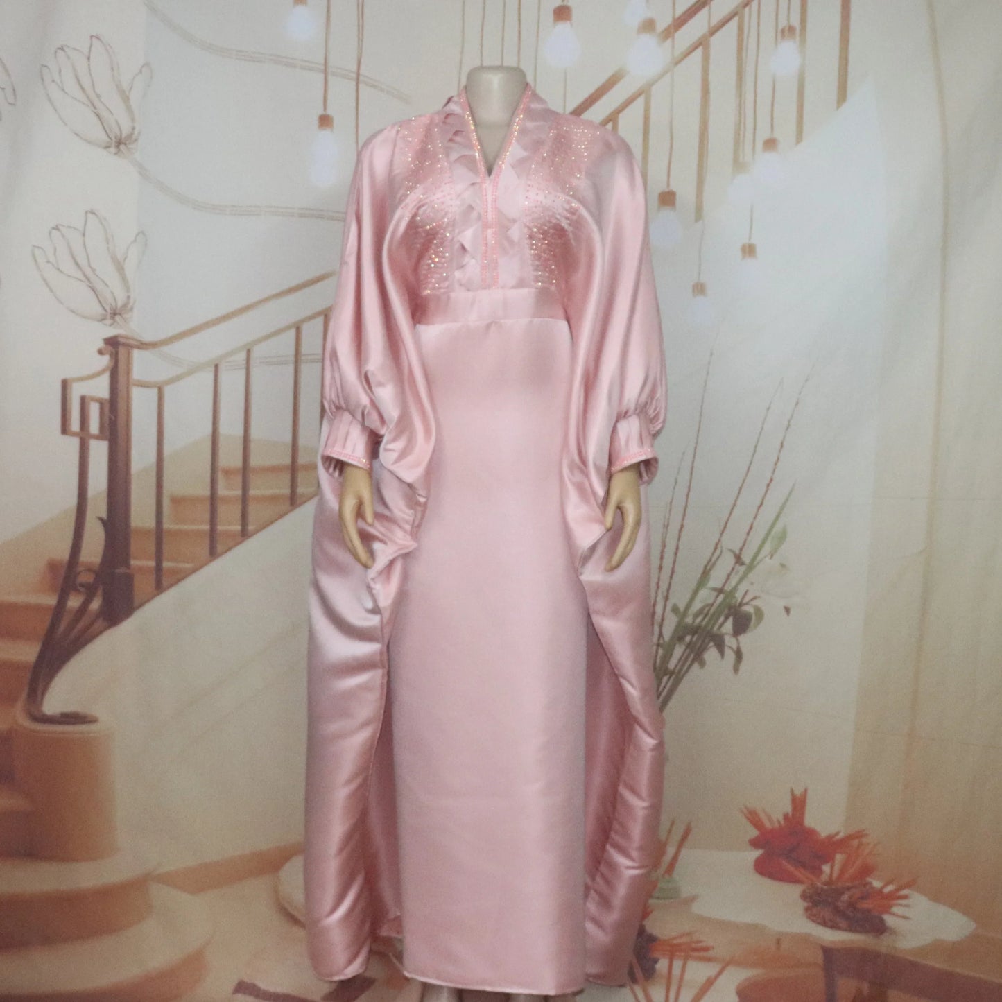 Luxurious elegant V-neck rhinestone dress for women in vibrant African church boubou style, showcasing exquisite detailing and rich fabric.