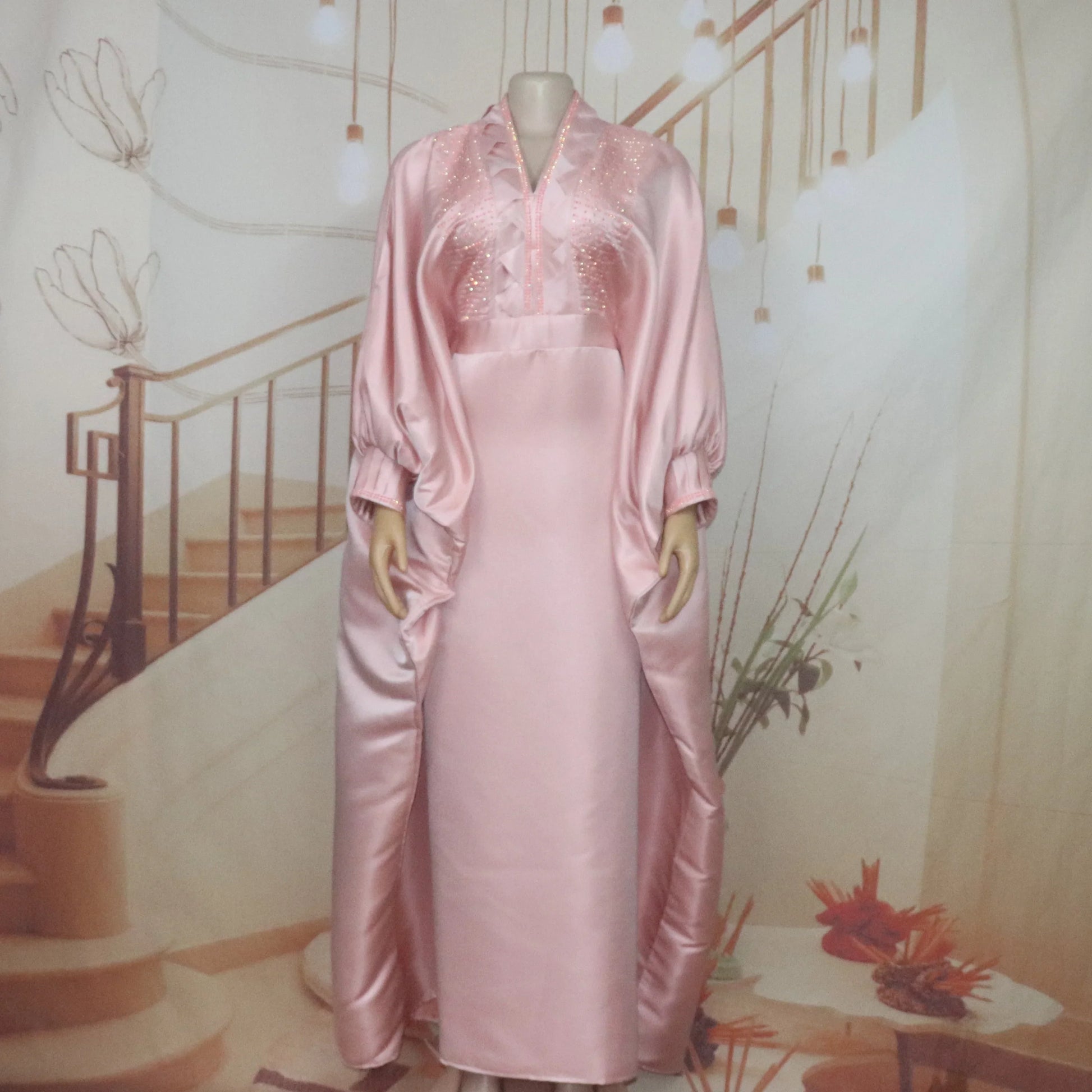 Luxurious elegant V-neck rhinestone dress for women in vibrant African church boubou style, showcasing exquisite detailing and rich fabric.