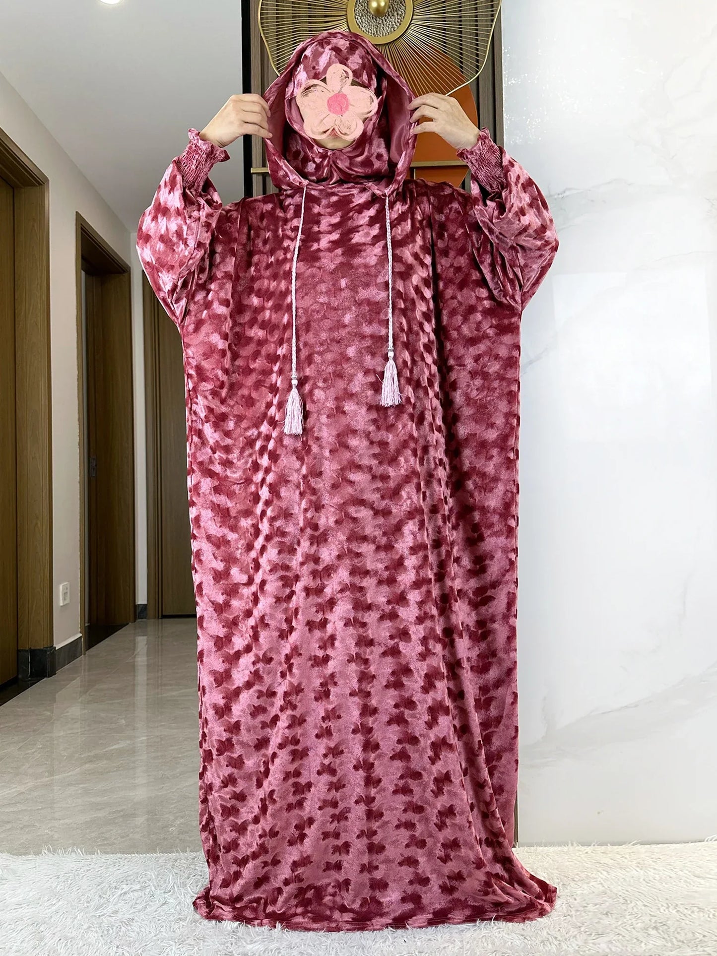 Elegant Muslim Abaya in luxury velvet fabric, designed in Dubai Turkey style with a pullover closure, showcasing sophisticated Islamic fashion for women.