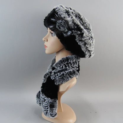Chic winter faux fur hat and scarf set displayed elegantly, combining luxurious materials and stylish design for the modern woman.