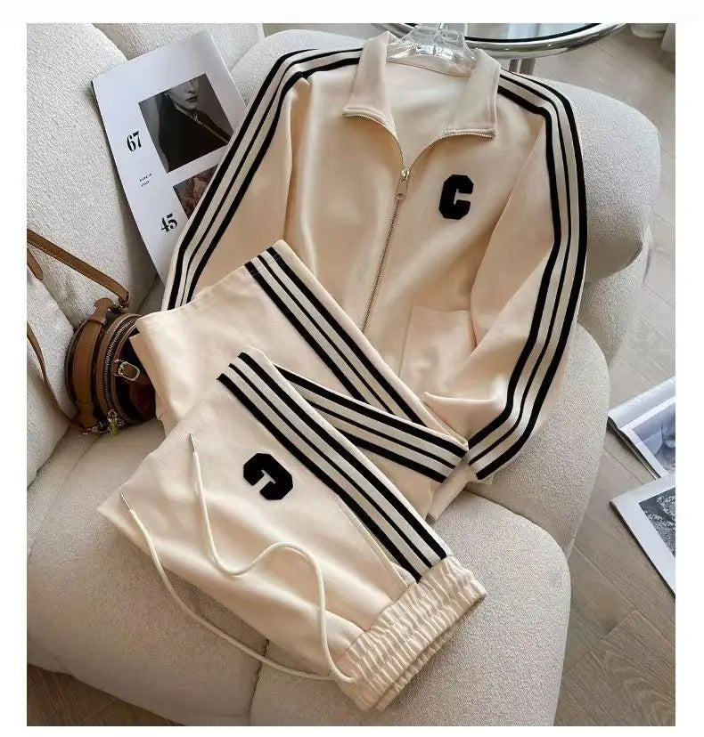 Luxury high-end women's autumn winter sports set featuring embroidered coat and wide leg pants, perfect for leisure or casual outings.