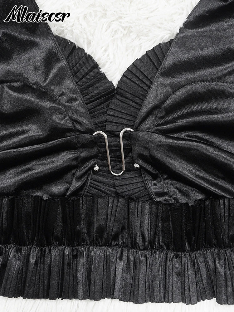 Mlaiscsr Elegant Black Dress Set displayed on a model, emphasising the edgy, asymmetrical silhouette and luxurious fabric composition of spandex and polyester.