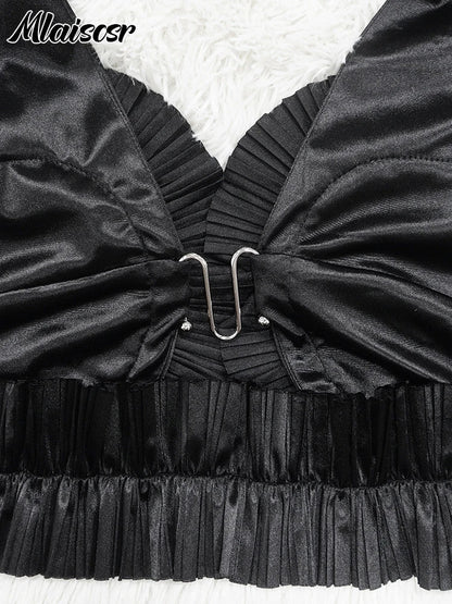 Mlaiscsr Elegant Black Dress Set displayed on a model, emphasising the edgy, asymmetrical silhouette and luxurious fabric composition of spandex and polyester.