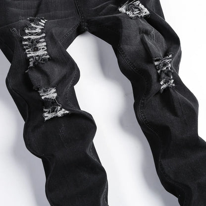 Fashion-forward men's skinny jeans featuring stylish rips, perfect for modern casual wear, tailored for comfort and sophistication.