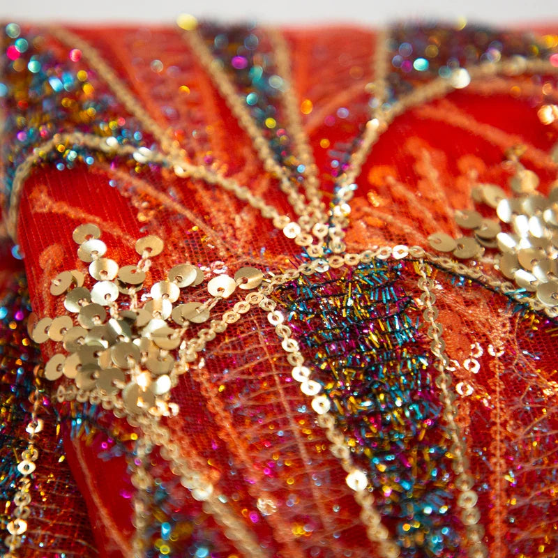 Luxurious polyester-cotton mesh lace fabric featuring sparkling rhinestones, perfect for adding glamour to special occasion dresses.