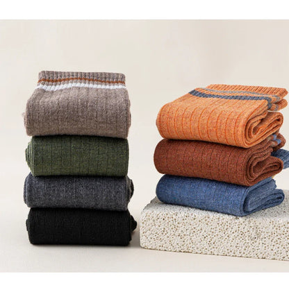 Men's comfortable and fashionable mid-tube socks, crafted for durability and a snug fit during winter sports.