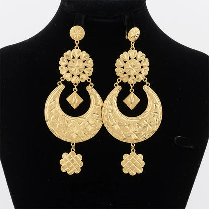 Stunning geometric design of 18K gold plated drop earrings with copper tassel, ideal for fashionable women who appreciate luxury.