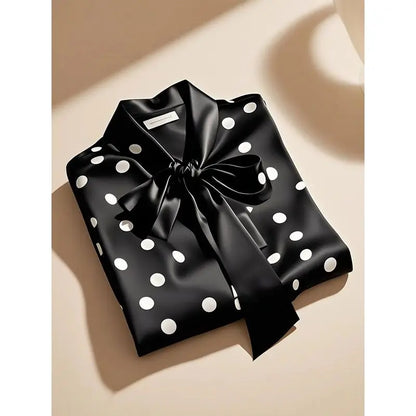 Luxurious Women’s Satin Polka Dot Blouse featuring lace-up bow design, perfect for an elegant office look.