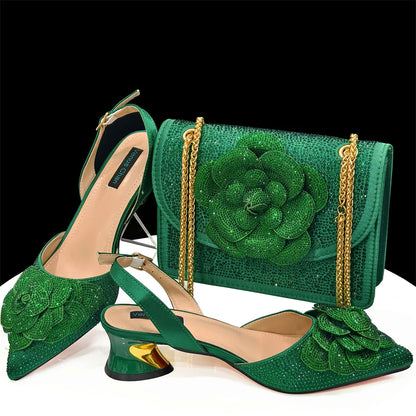 Elegant women's pointed-toe pump and bag set featuring a large flower and dazzling rhinestone detail, perfect for special occasions.