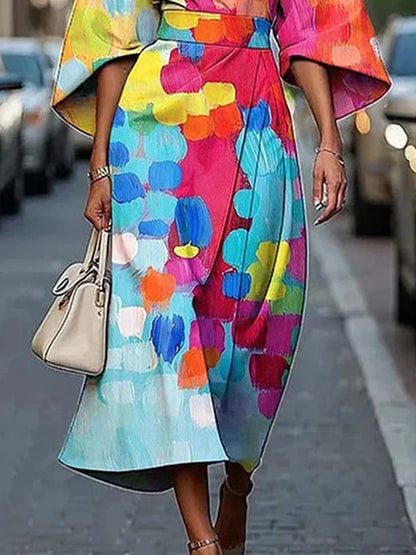 Elegant close-up of Modigirl Women's Summer Midi Dress showcasing intricate African prints against a soft polyester fabric.