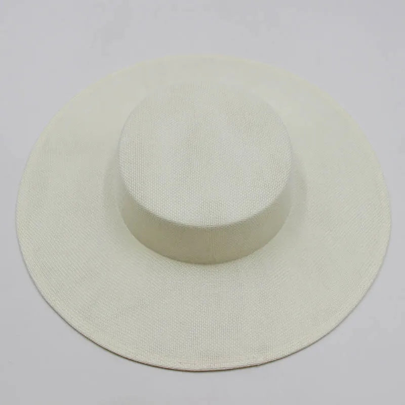 Chic ladies fascinator hat with a sophisticated wide brim, a must-have accessory for upscale events.