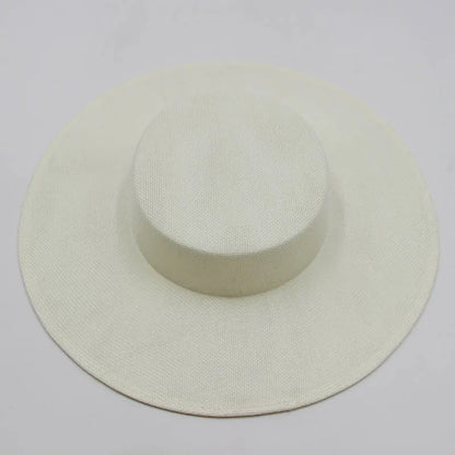 Chic ladies fascinator hat with a sophisticated wide brim, a must-have accessory for upscale events.