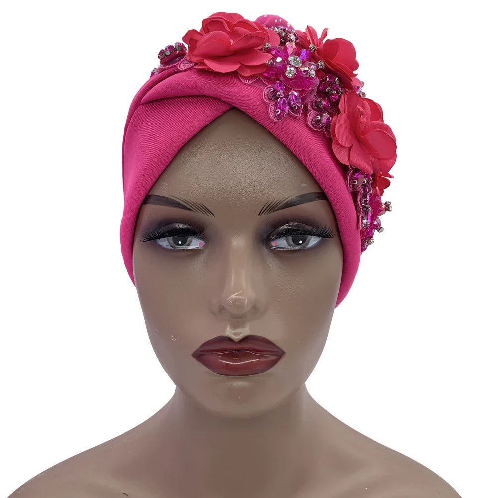 Model wearing the Elegant African Turban Cap, demonstrating a chic and fashionable look suitable for all occasions.