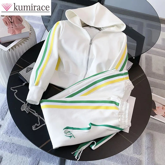 Luxurious women's spring and autumn casual sports set featuring a fashionable hoodie and skinny pants, ideal for stylish activewear.
