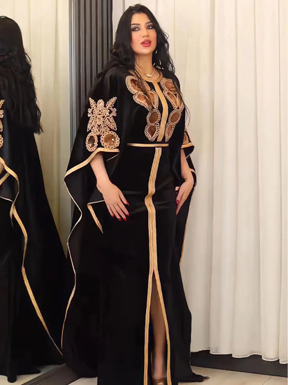 Elegant Golden Velvet Abaya with sequins showcasing luxurious bat sleeves, perfect for Ramadan and special occasions.